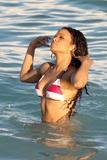Christina Milian in striped bikinis