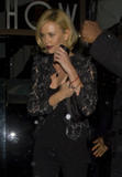th_86761_Preppie_-_Charlize_Theron_at_Mr._Chows_restaurant_in_Beverly_Hills_-_Feb._5_2010_216_122_340lo.jpg